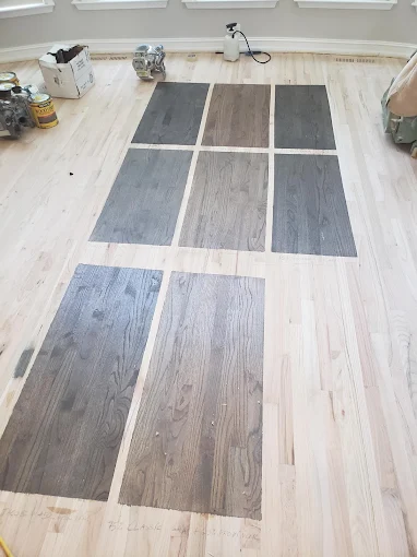 Custom stain samples on sanded hardwood floor